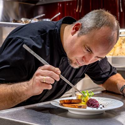 Chef Nico Finishing a Plate